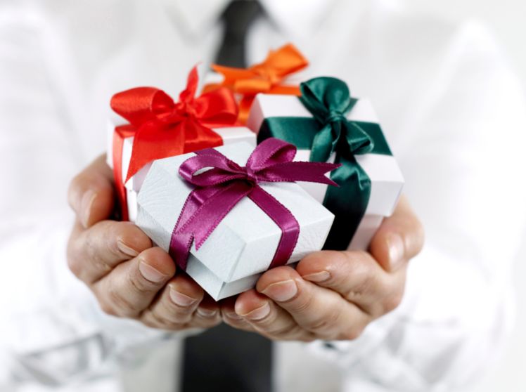 men holding gifts